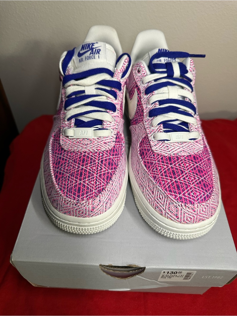 Nike Air Force 1 Low in Pink with Blue Accents